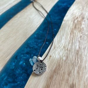 Silver Pendant Necklace with Blue Accents